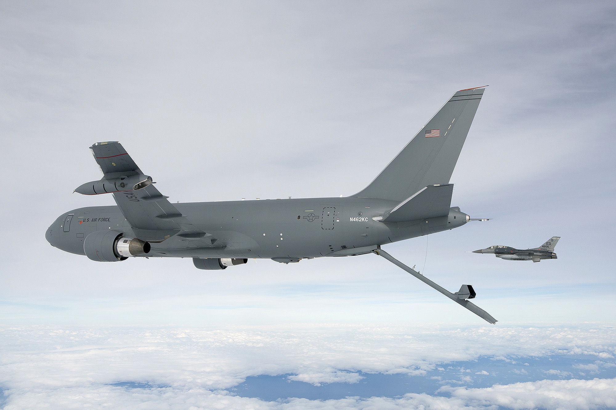 Boeing’s first KC-46 aerial-refueling tanker deploys its boom for the first time during a test flight Oct. 9, accompanied by a U.S. Air Force fighter. The tanker is based on Boeing’s 767 and assembled in Everett.