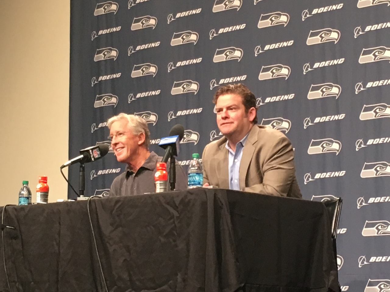 Seattle Seahawks general manager John Schneider (right) and coach Pete Carroll address the media Tuesday at the Virginia Mason Athletic Center in advance of the NFL draft, which takes place Thursday through Saturday.