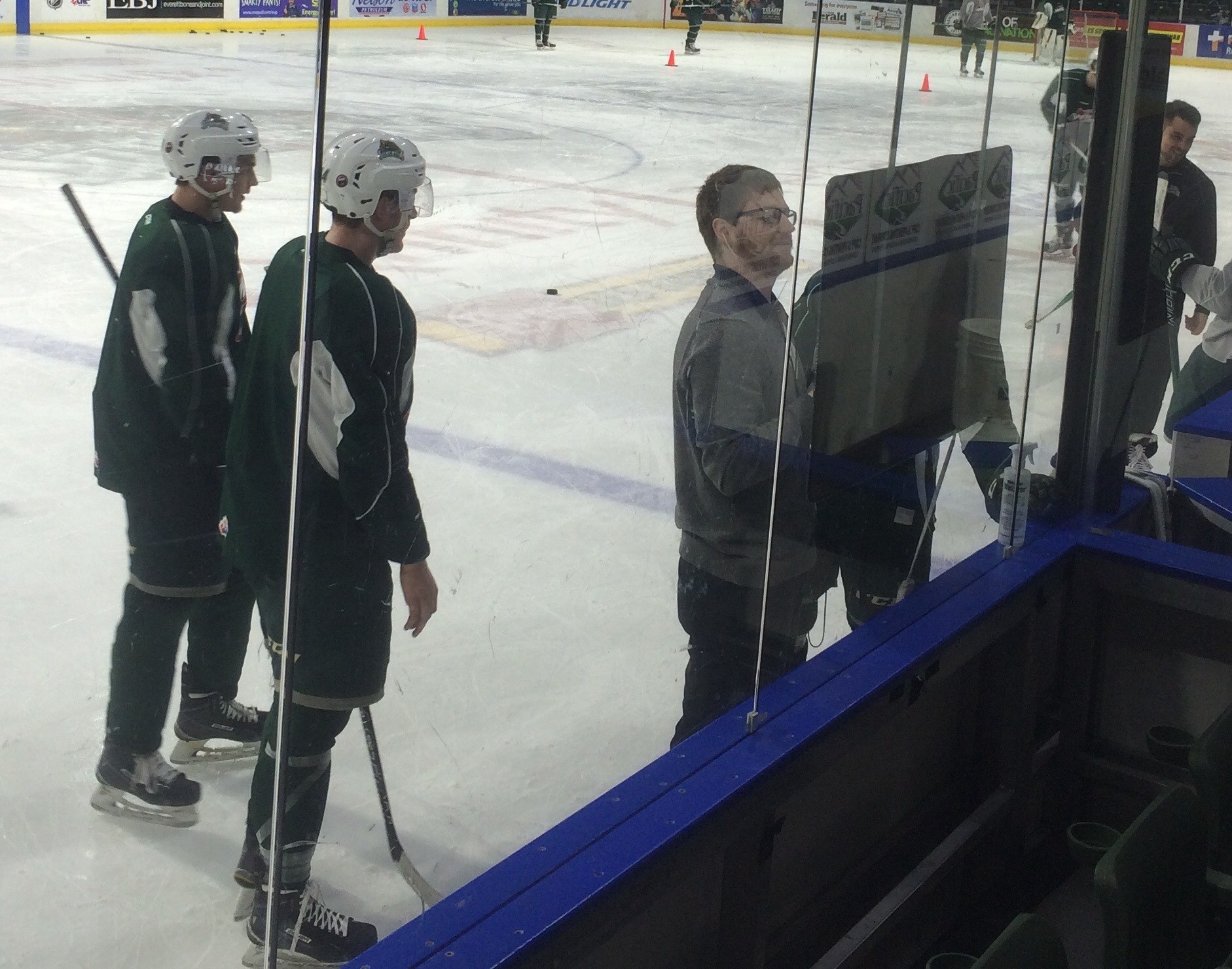 Hockey ops assistant Patrick Pajak laced up skates Thursday and diagrammed plays on the white board.