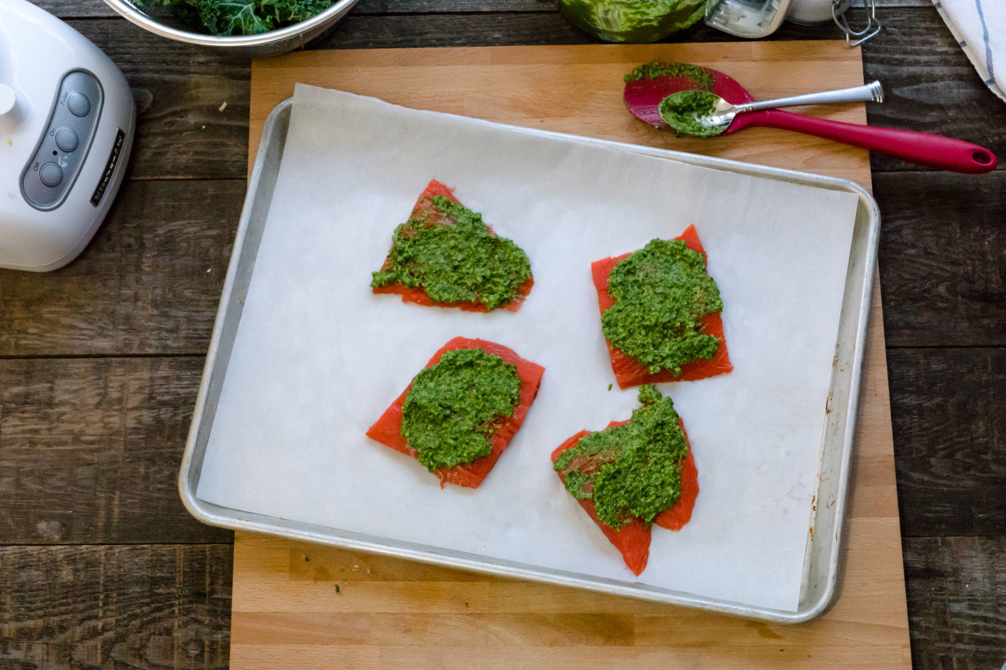 A familiar dish like salmon helps pave the way for kids to explore the unfamiliar, such as this kale pesto.