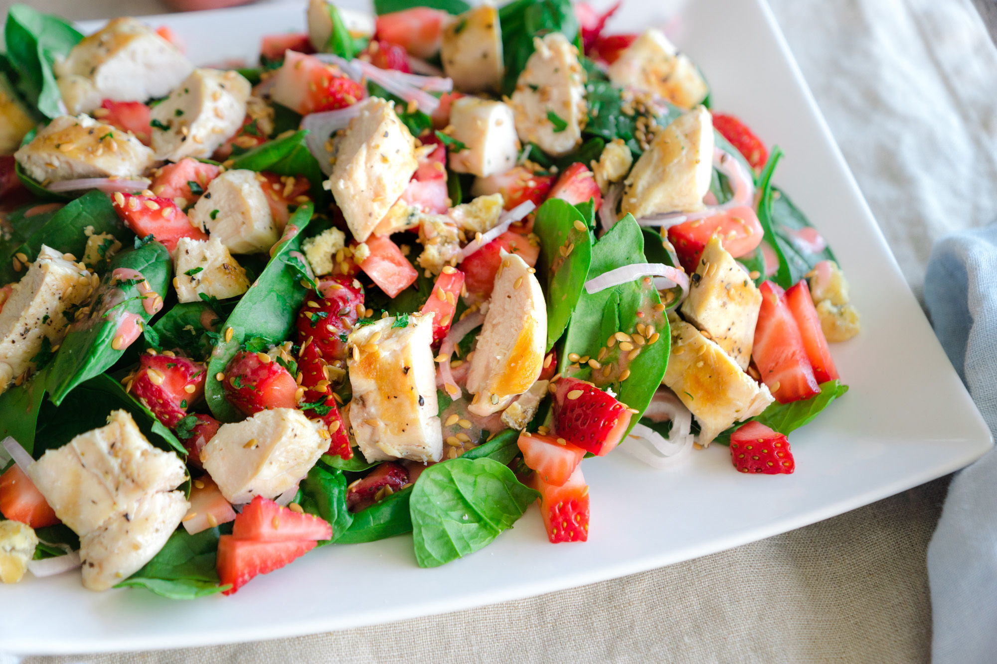 Rose McAvoy / For The Herald Spinach salad with grilled chicken