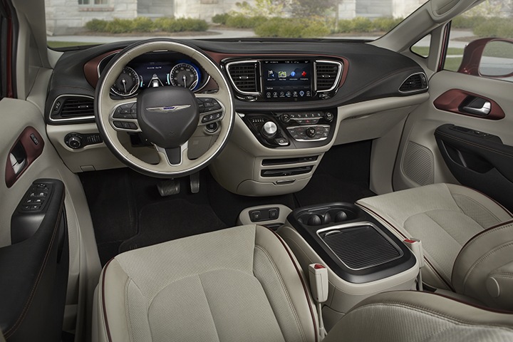 The front driver and passenger seats of the 2017 Chrysler Pacifica minivan.