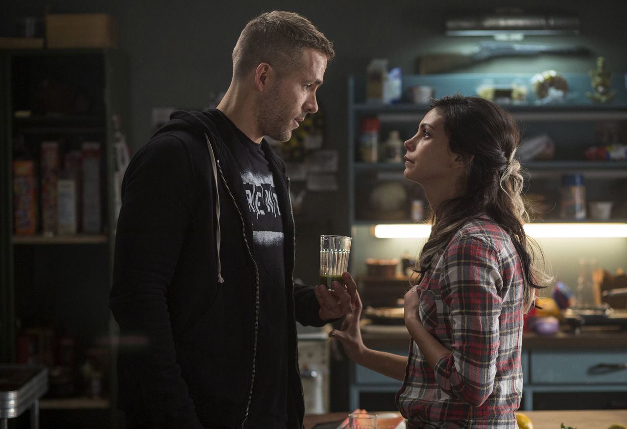 Ryan Reynolds and Morena Baccarin in a scene from “Deadpool.”