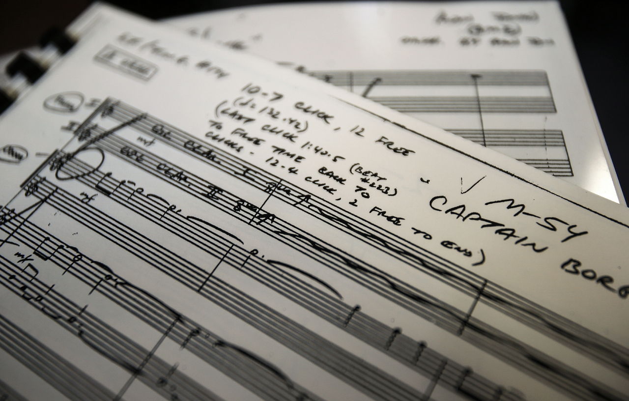 Dan Bates / The Herald Ron Jones turns a page in the original score from Star Trek, The Next Generation, from "Best of Both Worlds." The London Symphony wanted to do the cues for "First Attack" and "Captain Borg," which is where the Borg turned Captain Picard into a Borg.