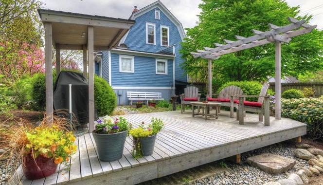 Lovely walkways, gardens and patio space cover the property.