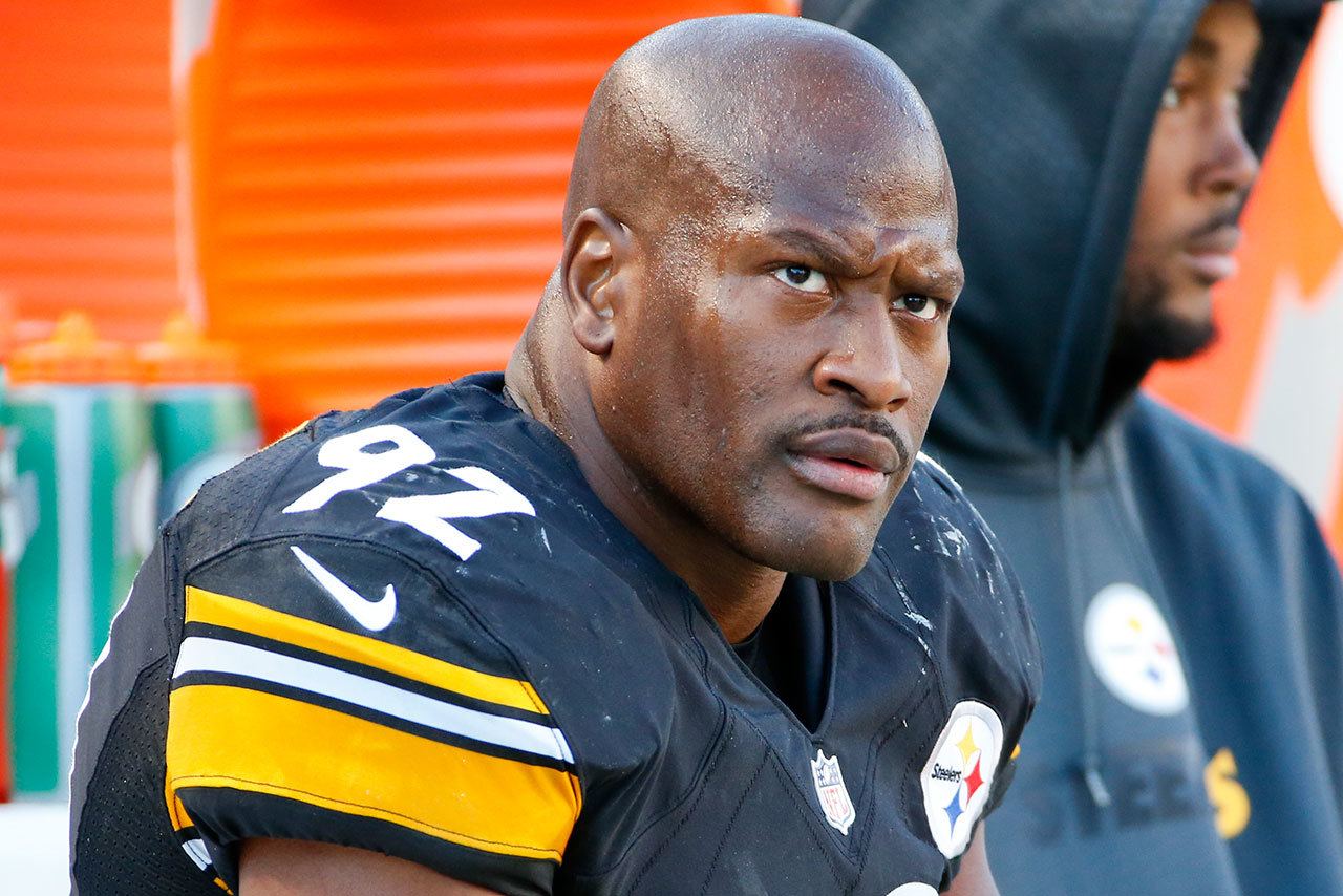 In this Nov. 8, 2015, photo, Pittsburgh Steelers outside linebacker James Harrison (92) sits on the sidelines during an NFL game against the Oakland Raiders in Pittsburgh. The NFL players’ union says Harrison met Thursday with league investigators looking into allegations linking him to performance-enhancing drugs. (AP Photo/Gene J. Puskar, File)