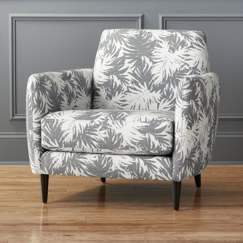 Pull up the Hill-Side Palm Leaves Parlour Chair, with its sun-washed palm-fronds pattern, for a funky yet mature seat.
