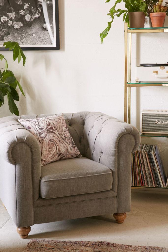 The Sofia Chesterfield Chair updates the classic Chesterfield sofa with light-colored bun feet and cotton-linen upholstery.
