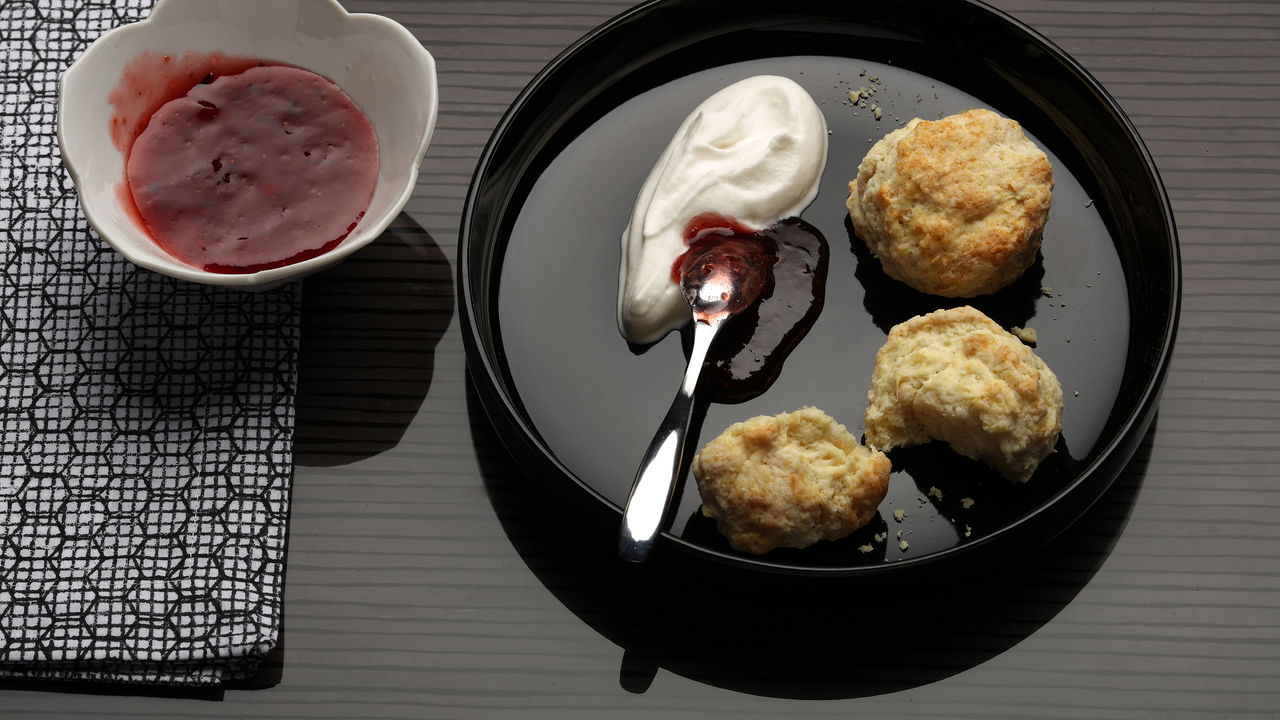 A scone should not be without jam and cream.