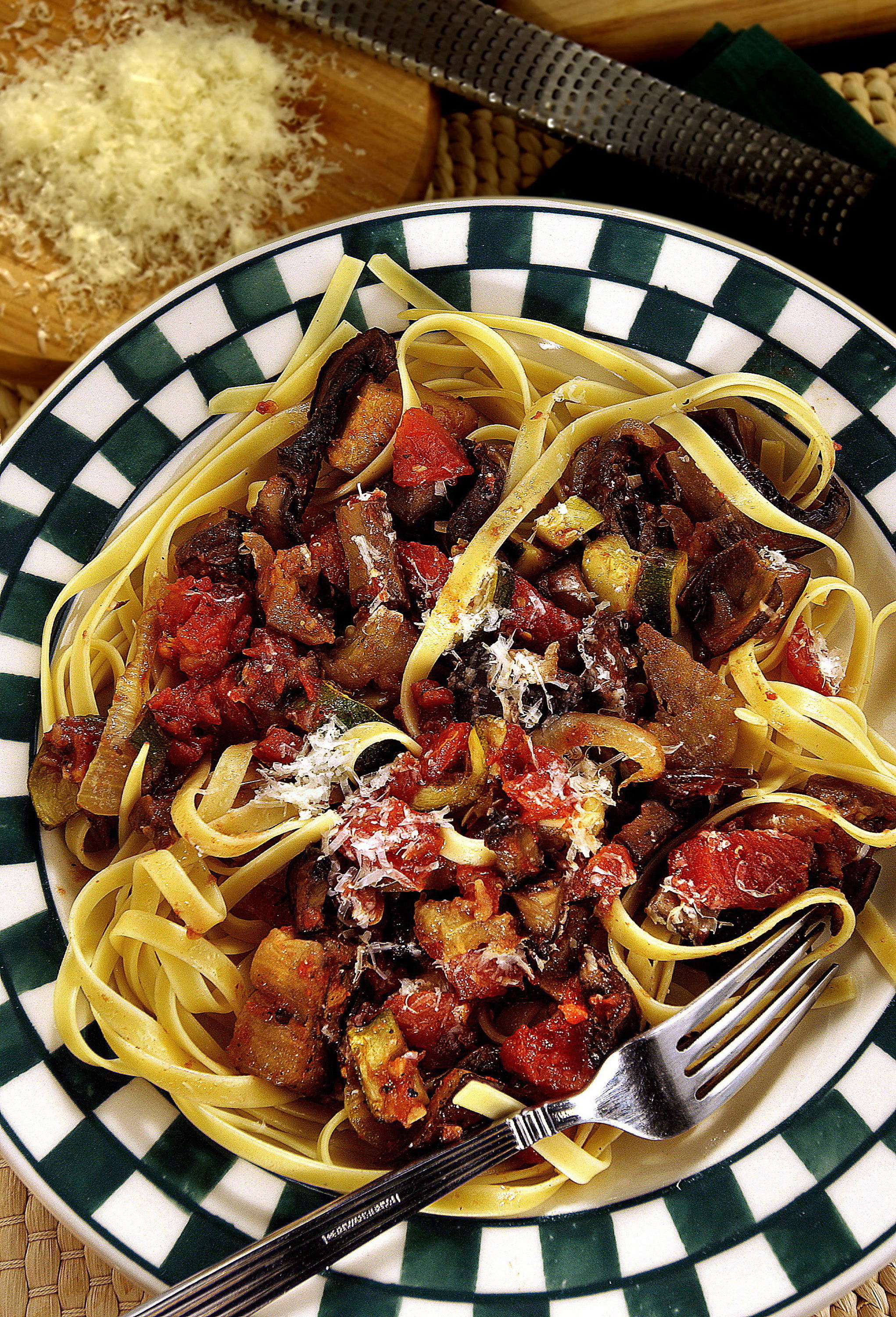 Bob Fila / Chicago Tribune / TNS Eggplant, zucchini and onions are roasted to sweeten their flavors, then are tossed with fettuccine for a simple, robust meal.