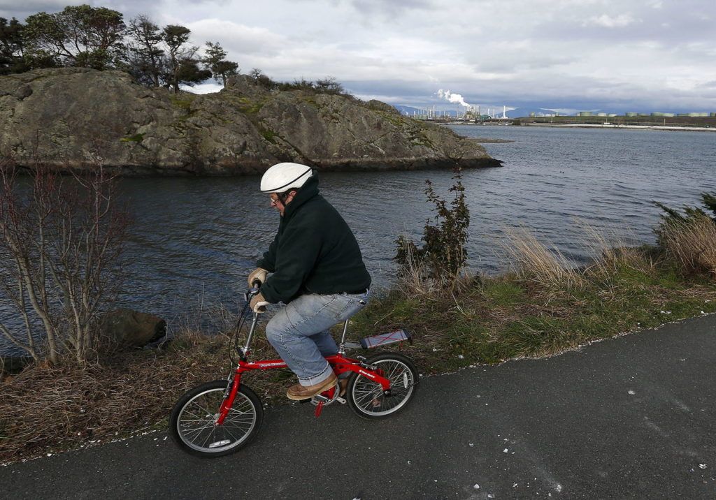 A cyclist makes his way along the Tommy Thompson Trail in Anacortes on Feb. 18.
