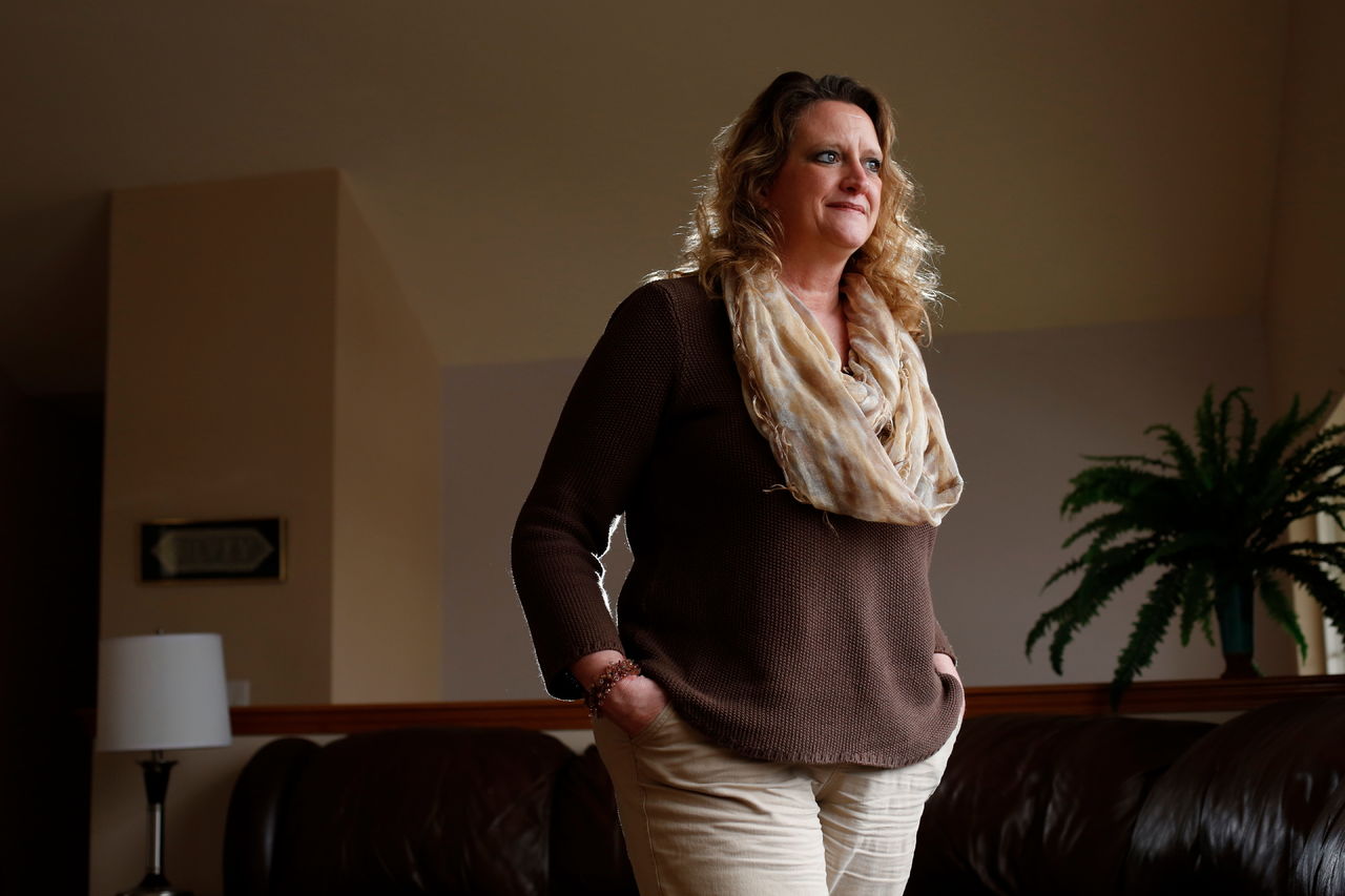 At home in Monroe, Tara Silvey, 47, reflects on the heart attack she survived, in October 2015. Although she is trained in CPR, she did not realize she was having a heart attack.