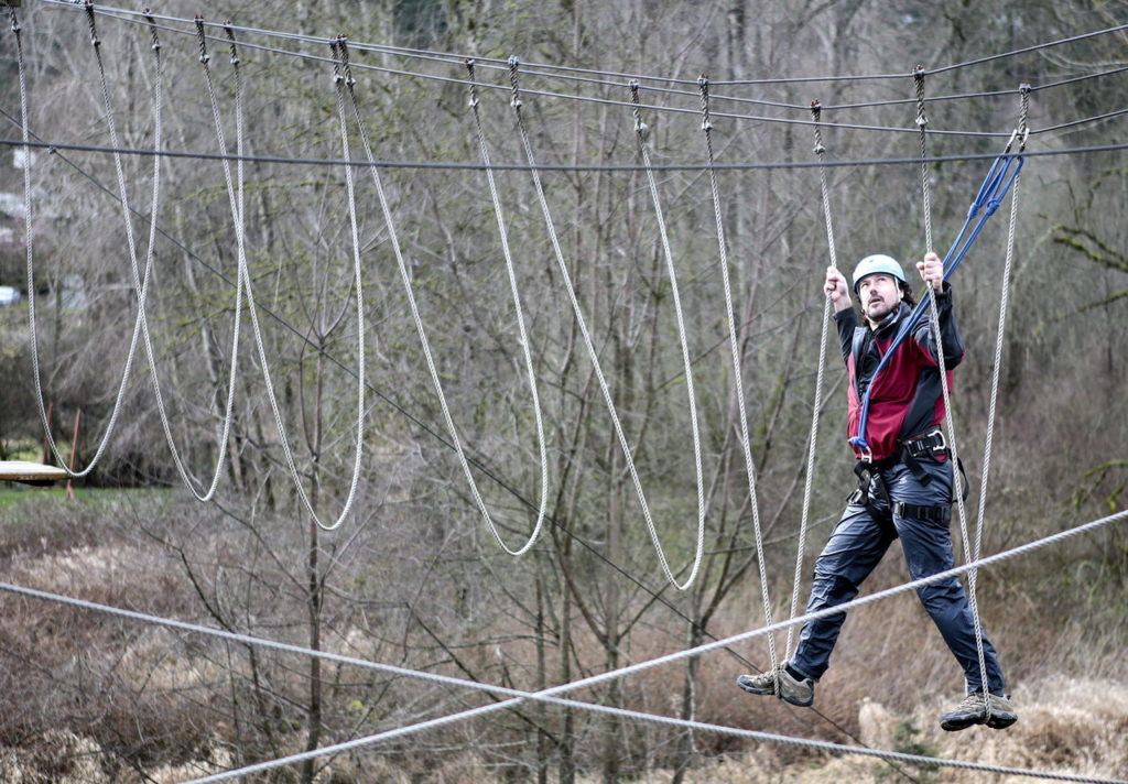 Dan Tranvers makes his way through an aerial obstacle.
