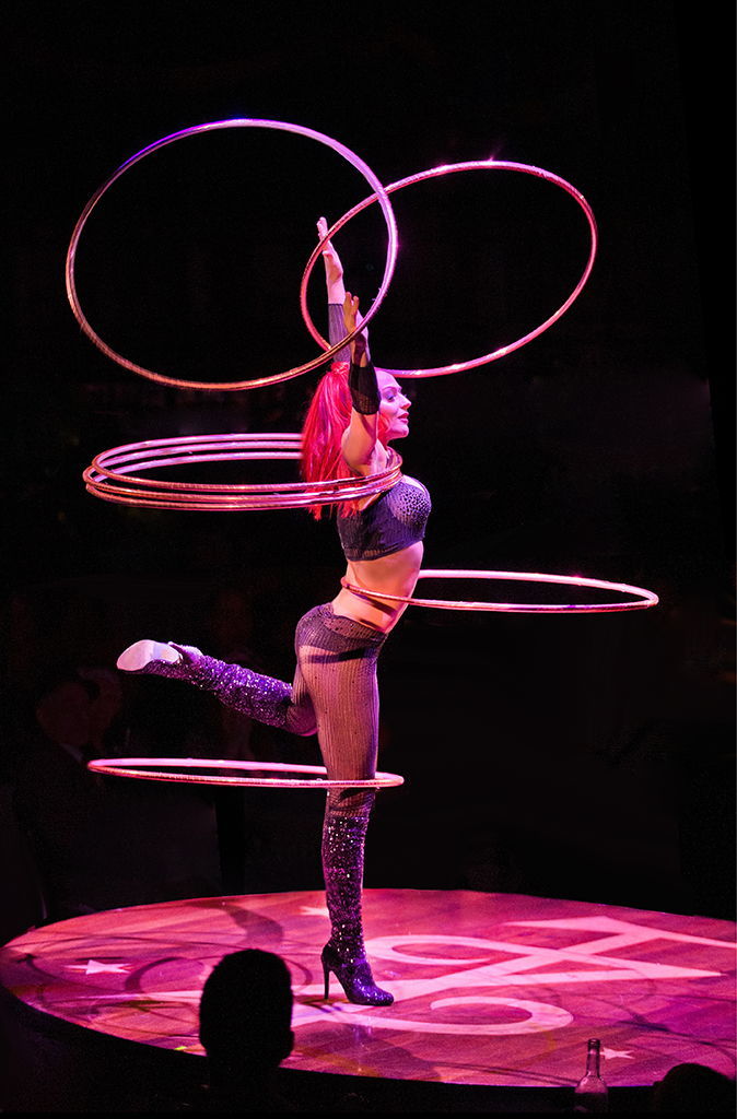 Vita Radionova, a Ukrainian contortionist, does amazing things with hoops in Teatro ZinZanni’s production of “Be Italian.”