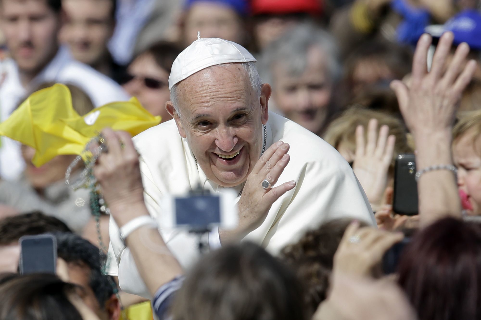 Pope Francis smiles as he blesses faithful as he arrives in St. Peter’s Square to attend a jubilee audience at the Vatican on Saturday. Pope Francis said Friday that Catholics should look to their own consciences rather than rely exclusively on church rules to negotiate the complexities of sex, marriage and family life, demanding the church shift emphasis from doctrine to mercy in confronting some of the thorniest issues facing the faithful.