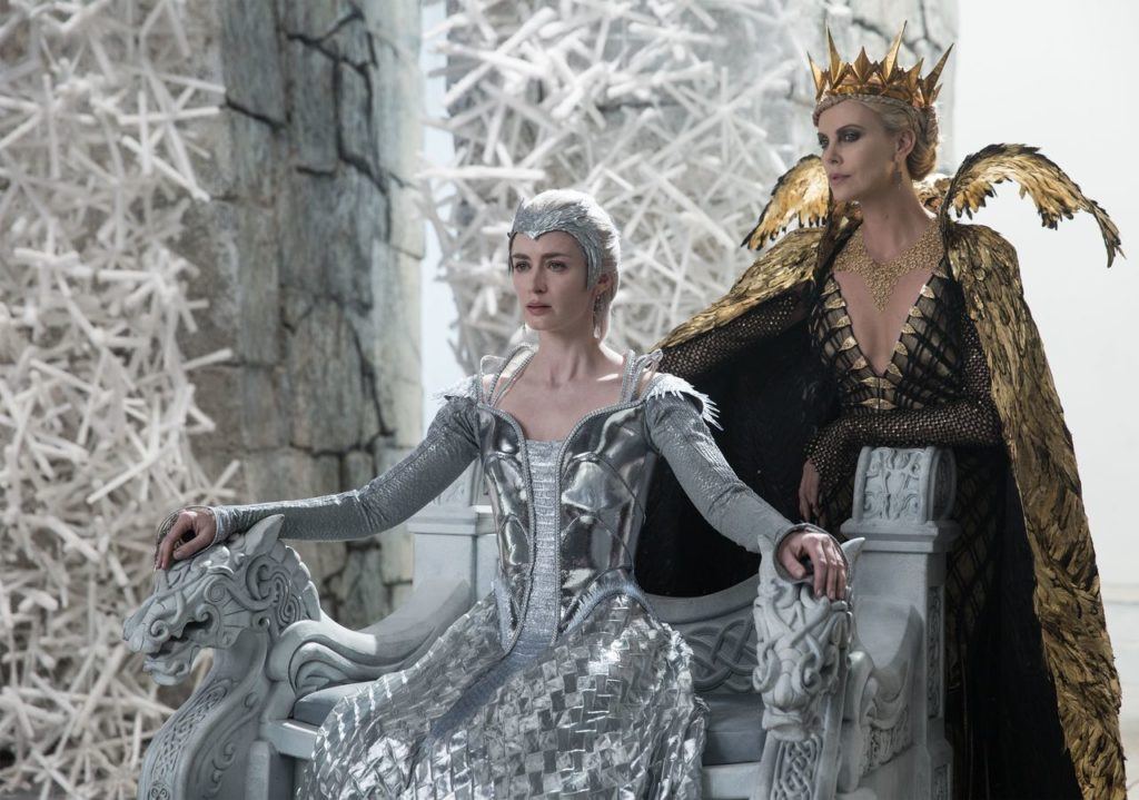 Emily Blunt (left) and Charlize Theron co-star in “Huntsman: Winter’s War.”
