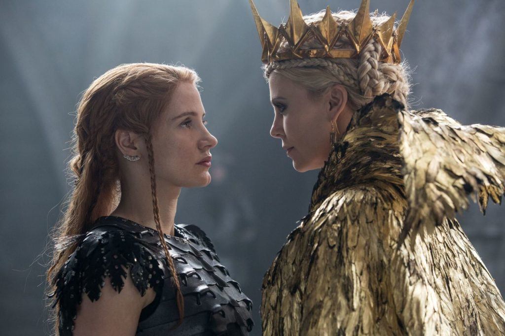 Jessica Chastain (left) and Charlize Theron co-star in “Huntsman: Winter’s War.”
