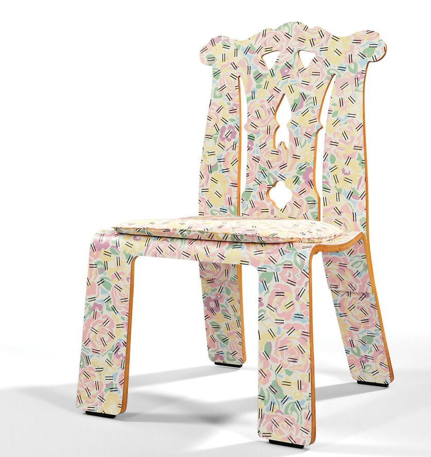The flowers on this 1985 plywood “Chippendale” chair by Robert Venturi were inspired by a tablecloth. Black lines change it to a more modern look. The 37- inch chair auctioned for $6,150.