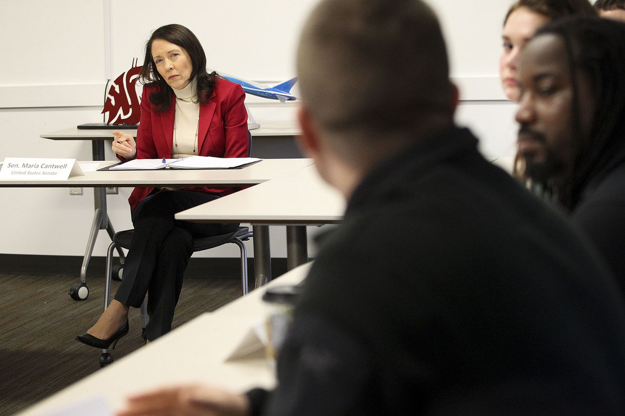 U.S. Sen. Maria Cantwell (left) listens to students from Everett Community College speak of their struggles to make ends meet while attending college during a meeting in Everett on Friday.