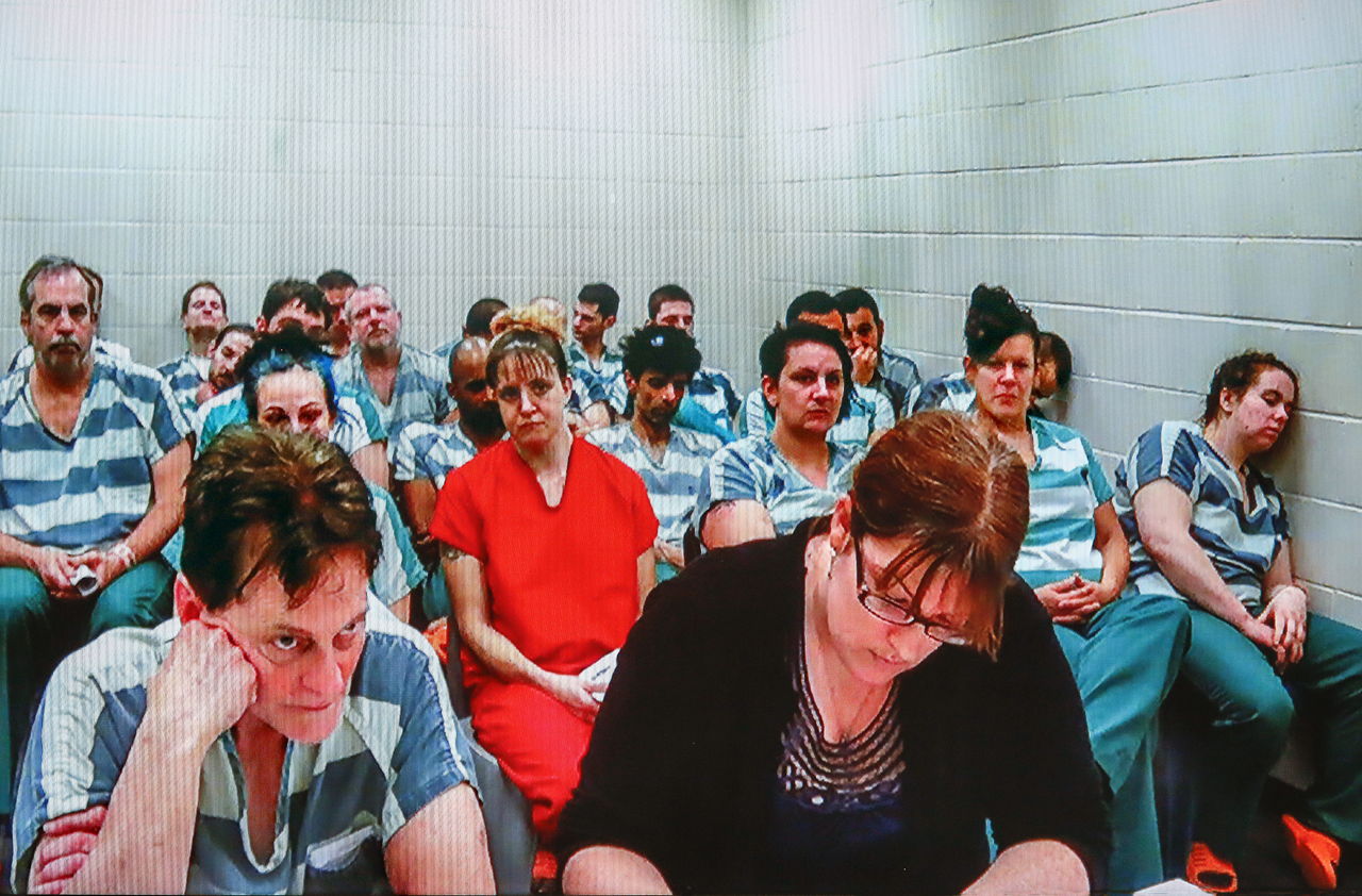 Christian Franzwa (front left) and others face a judge during a bail hearings via television from the Snohomish County Jail on Tuesday.