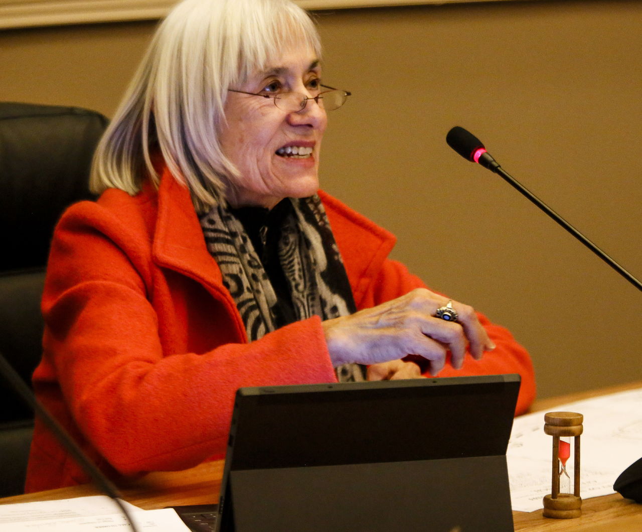 Snohomish Mayor Karen Guzak starts the pink-sand timer for a speaker on February 2.