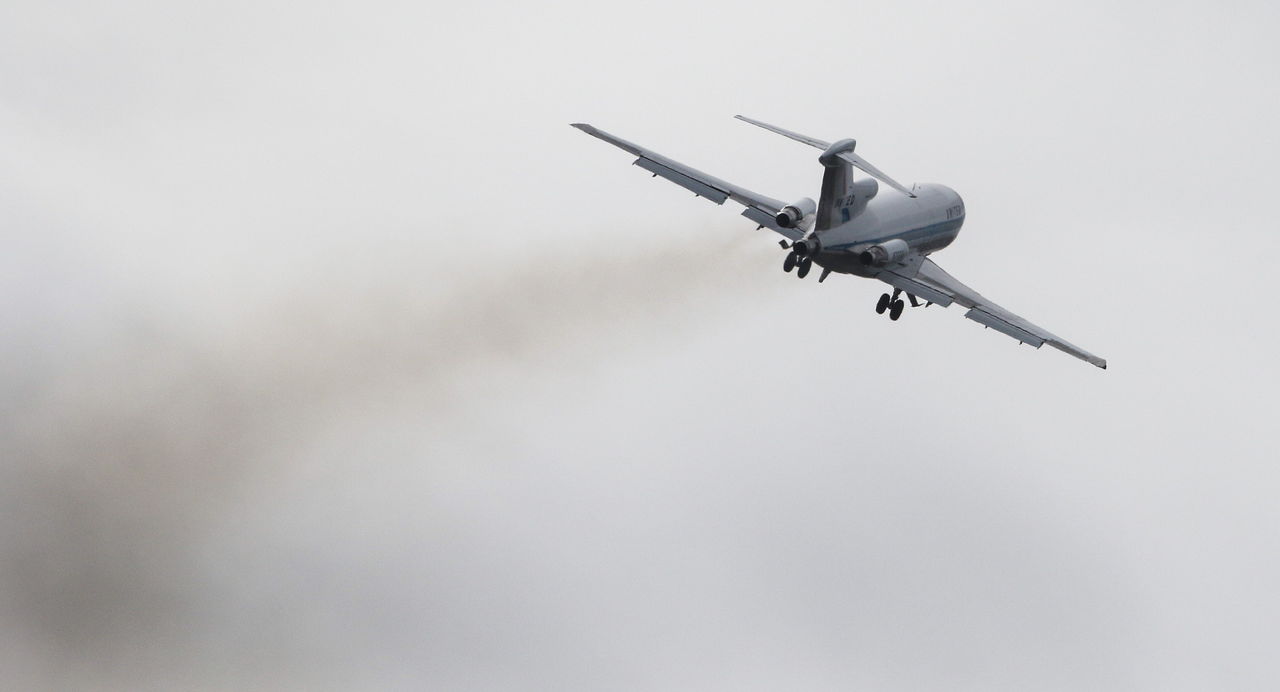 The first Boeing 727 climbs away from Paine Field in Everett en route to Boeing Field in Seattle on Wednesday.