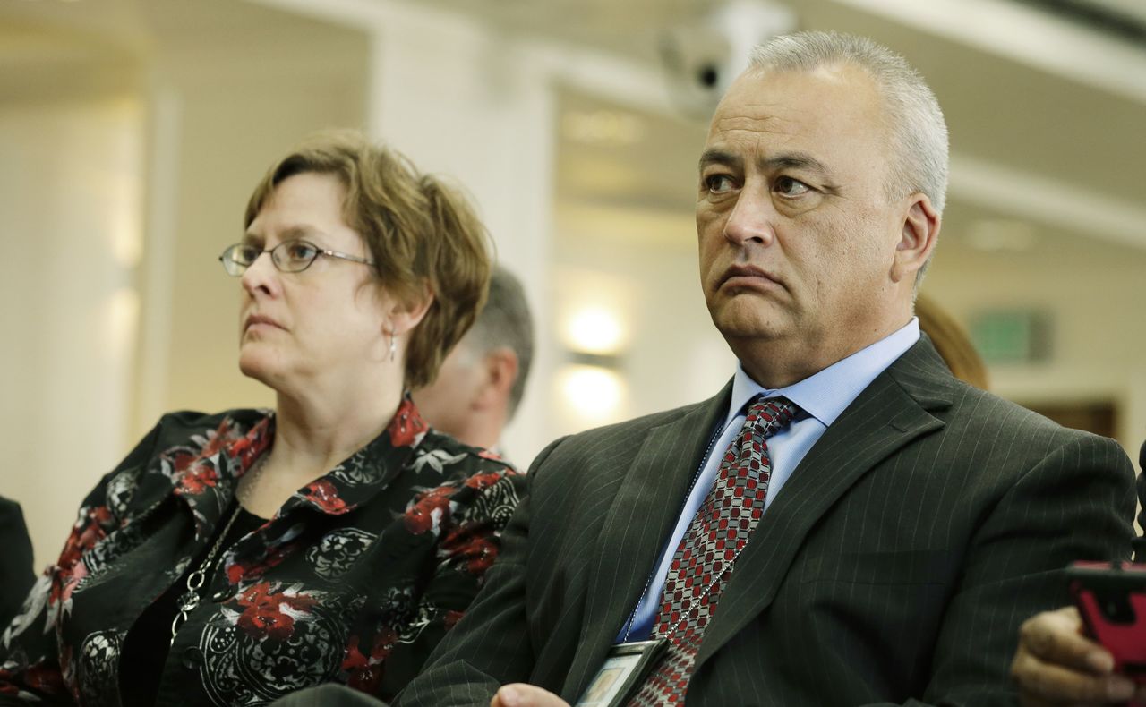 Washington state Corrections Secretary Dan Pacholke (right) and Deputy Secretary Jody Becker-Green listen to testimony in February in Olympia during a Senate Law and Justice Committee hearing.