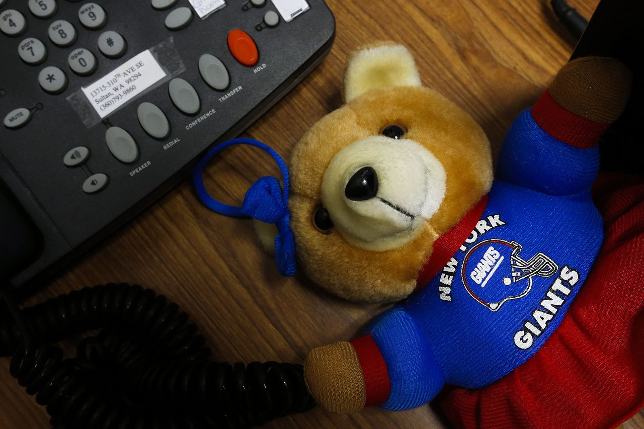 A New York Giants stuffed animal sits on Craig Hess’s desk at Sultan High School on Friday. Hess grew up in New York but now works with the Snohomish County Sheriff’s Office as a school resource officer.