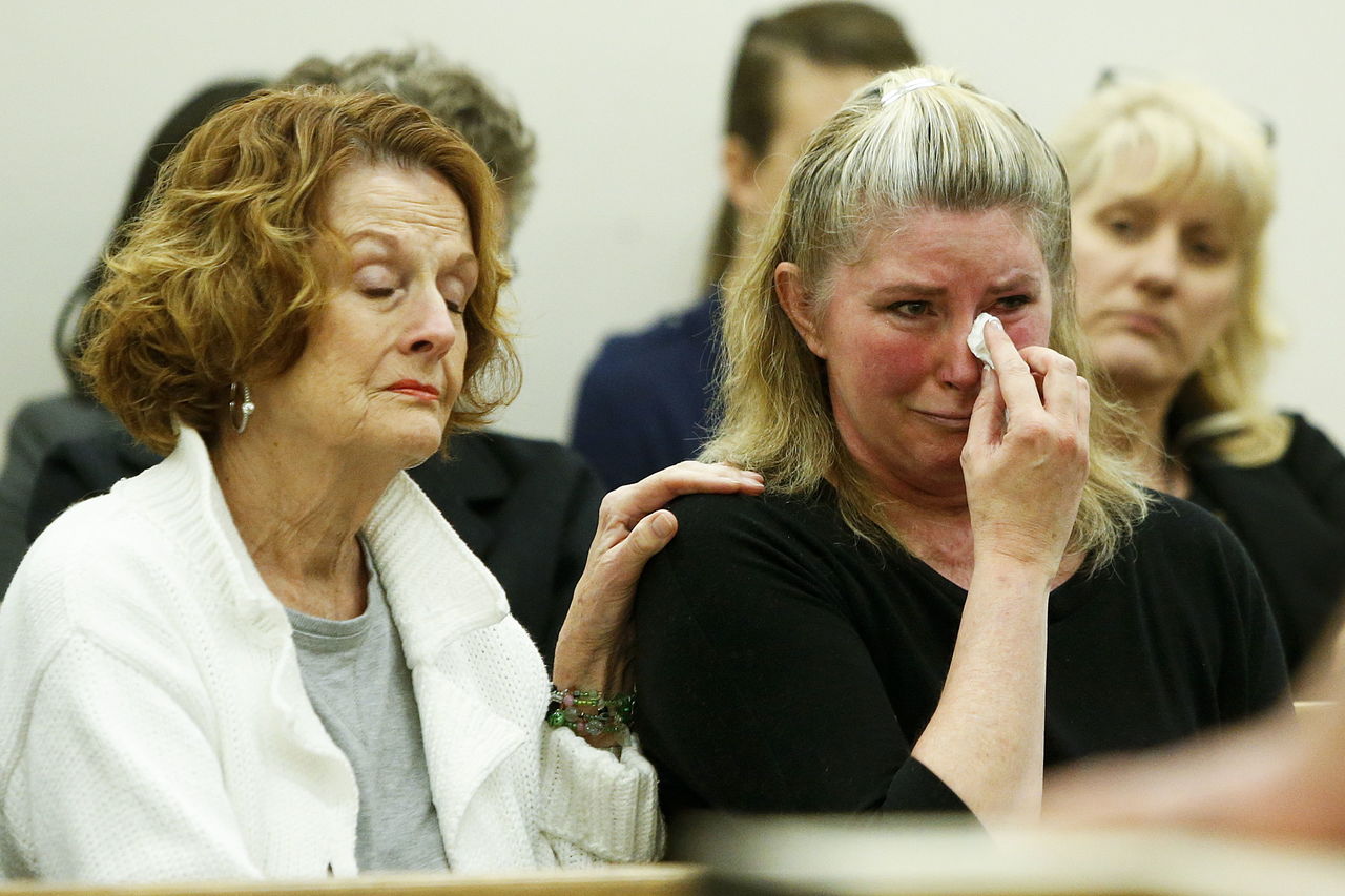 Brenda Welch (right) sheds tears Wednesday during the sentencing of her ex-husband, David Morgan, who convicted of trying to kill her at his Lynnwood home in 2014. Morgan was sentenced to more than 21 years for fracturing Welch’s skull and setting her on fire.