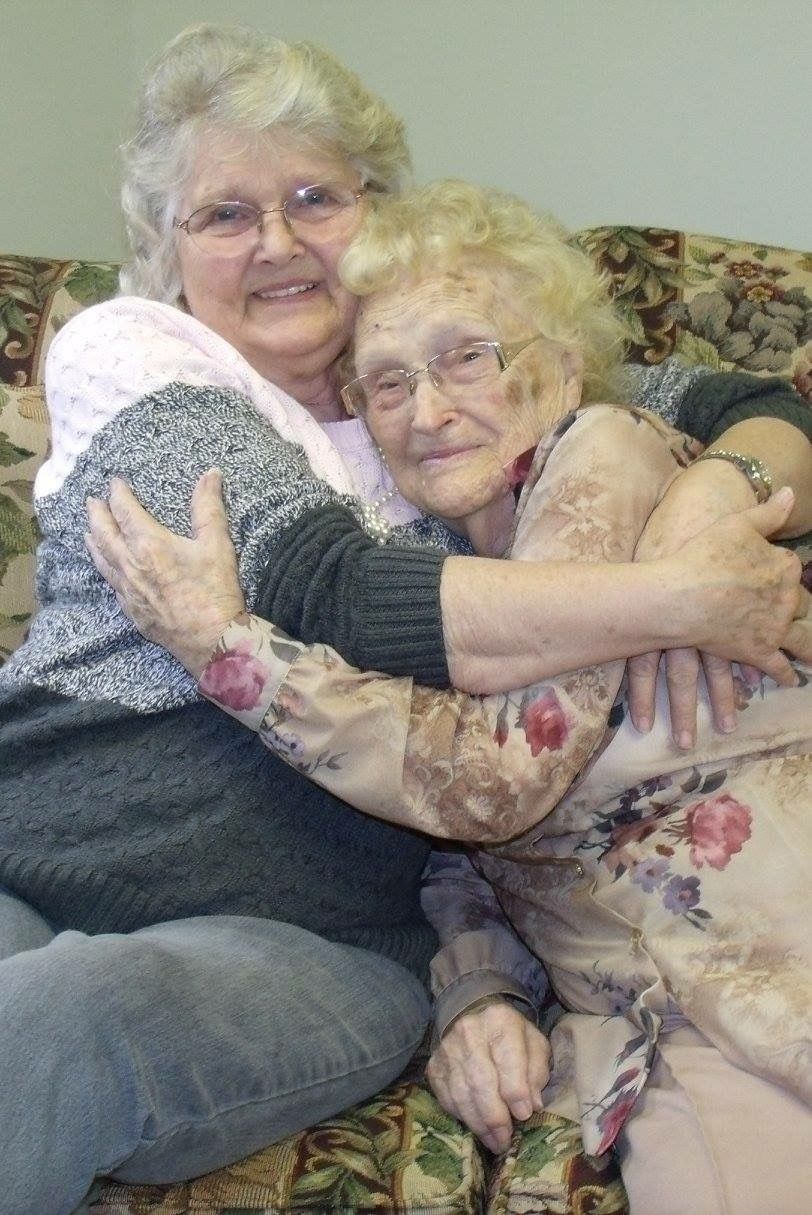 Betty Morrell (left), and her birth mother, Lena Pierce, are reunited at the Greater Binghamton Airport in Binghamton, New York, on Jan. 15.