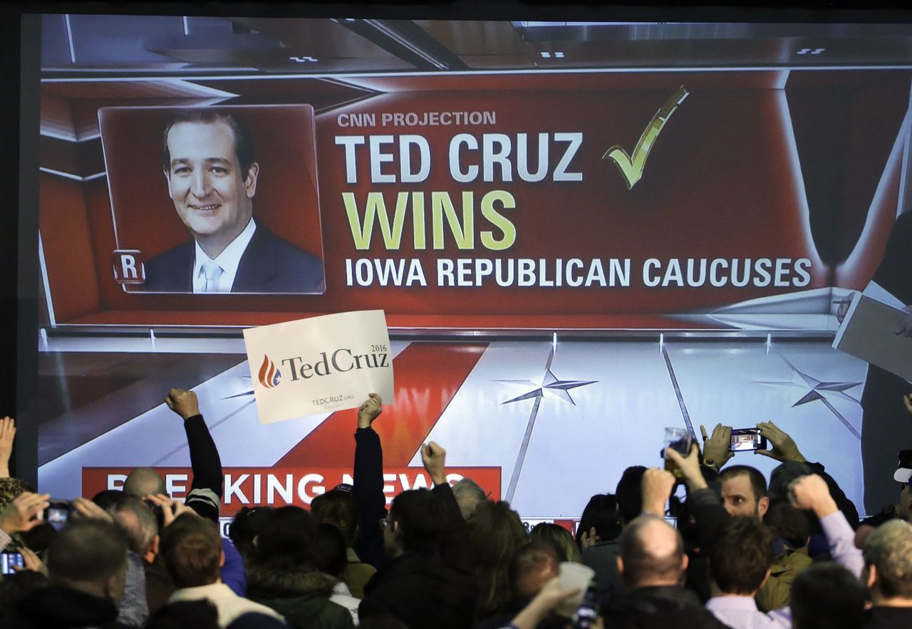 Supporters cheer as caucus returns are reported at Republican presidential candidate, Sen. Ted Cruz, R-Texas, caucus night rally Monday in Des Moines, Iowa.