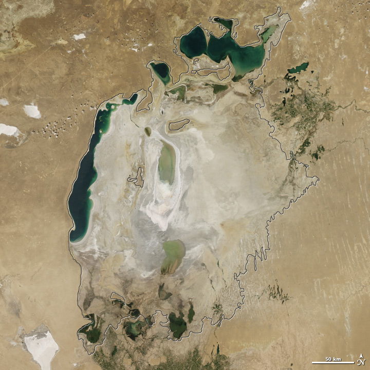 The Aral Sea in 2015. The body of water has shrunken in size dramatically in recent years due to water withdrawals from rivers that feed it. MUST CREDIT: NASA Earth Observatory.