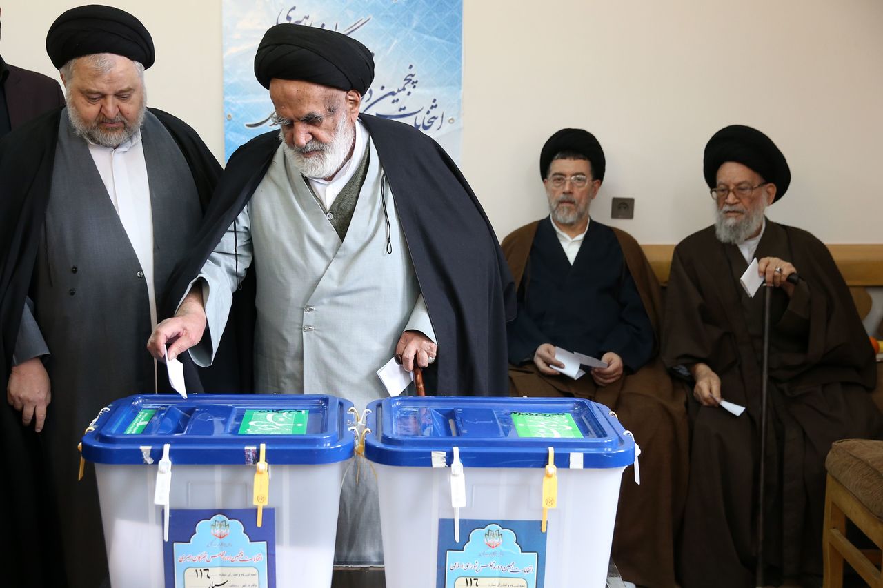 Clergymen cast their ballots in Qom on Friday.