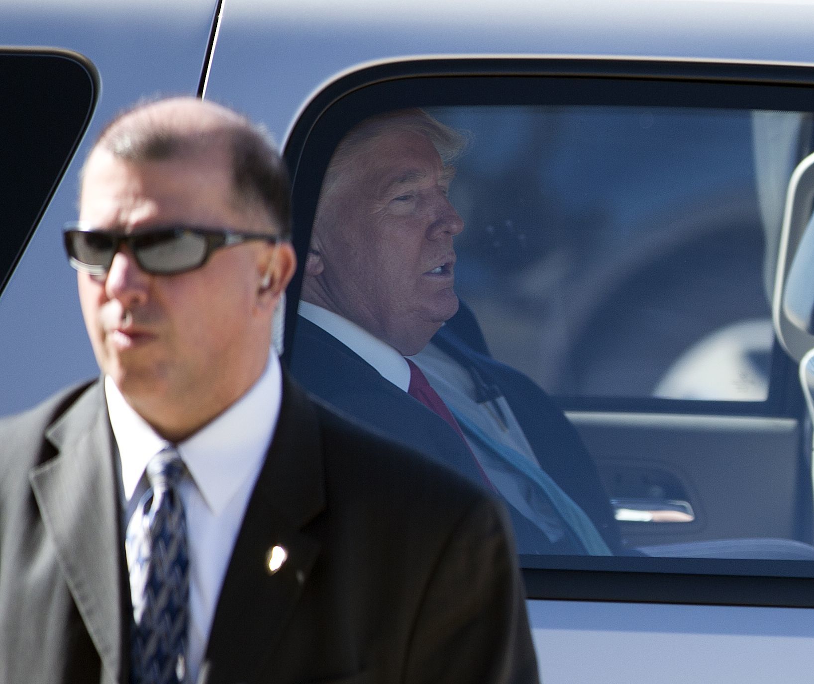 Republican presidential candidate Donald Trump leaves a rally Saturday in Bentonville, Arkansas.