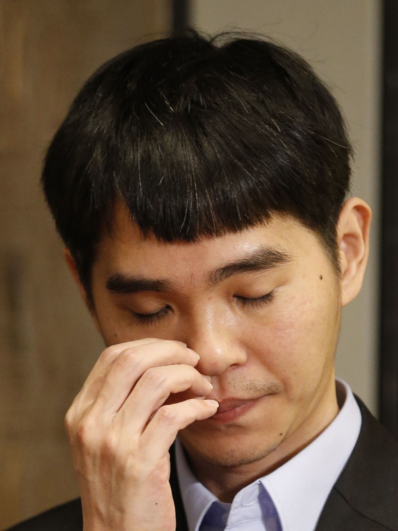 Professional Go player Lee Sedol waits for a press conference Saturday after losing a third match to the Google program AlphaGo in Seoul, South Korea.