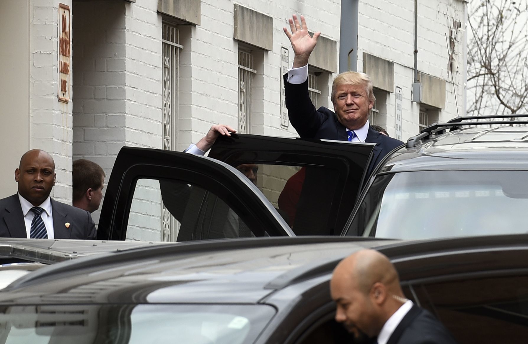 Republican presidential candidate Donald Trump gets into his vehicle in Washington on Thursday after a meeting with the Republican National Committee.