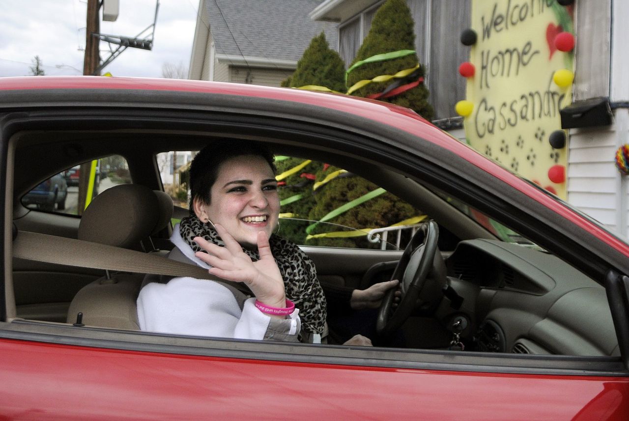 In this April 27, 2015, photo, Cassandra Callender arrives home with her mother in Windsor Locks, Connecticut, for the first time since December after a court-ordered chemotherapy for cancer treatment. Cassandra disclosed Saturday that a new cancer mass had been found in her lungs.
