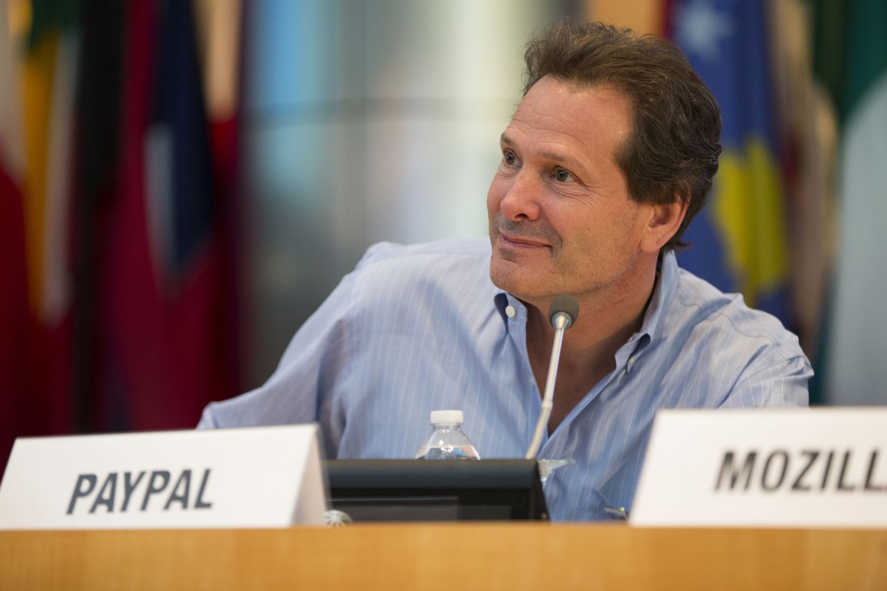 Evan Vucci / Associated Press Paypal President and CEO Dan Schulman listens during a Global Connect Initiative event Thursday at the World Bank in Washington, D.C. Schulman said in a statement that PayPal is ending plans to hire 400 people for a new operations center in Charlotte, North Carolina. The decision is among the largest tangible effects of a new North Carolina law overruling LGBT anti-discrimination measures passed by local governments.