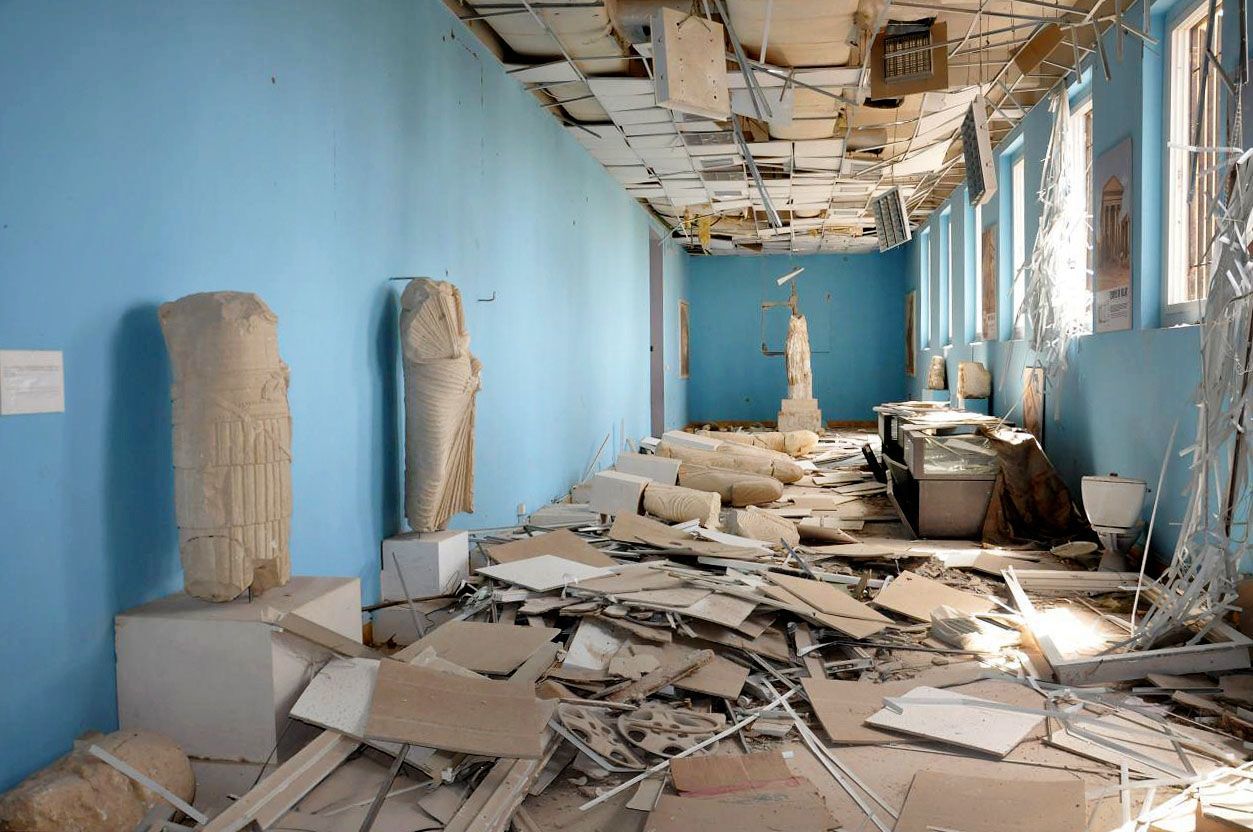 Destroyed statues are seen inside the damaged Palmyra museum.