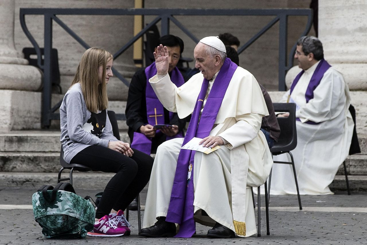 Pope Francis hears confession during the Youth Jubilee in Saint Peter square at the Vatican on Saturday.
