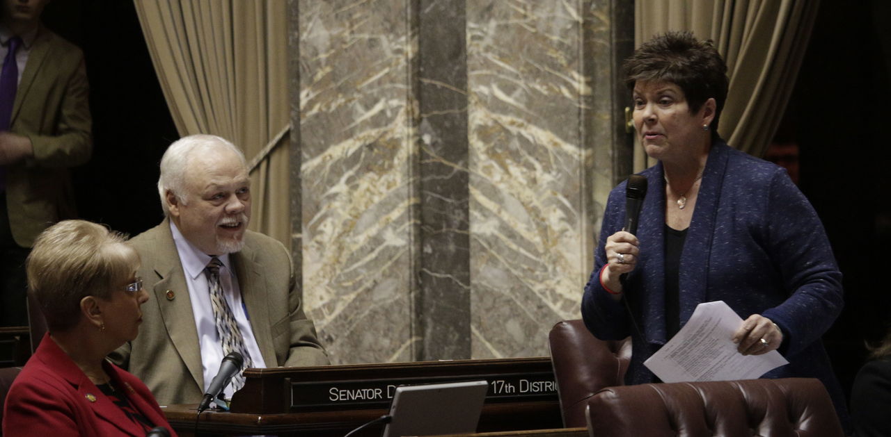 In Olympia, Republican Sen. Pam Roach (right) speaks in support of a measure that would have put a constitutional amendment, related to tax increases, before voters.