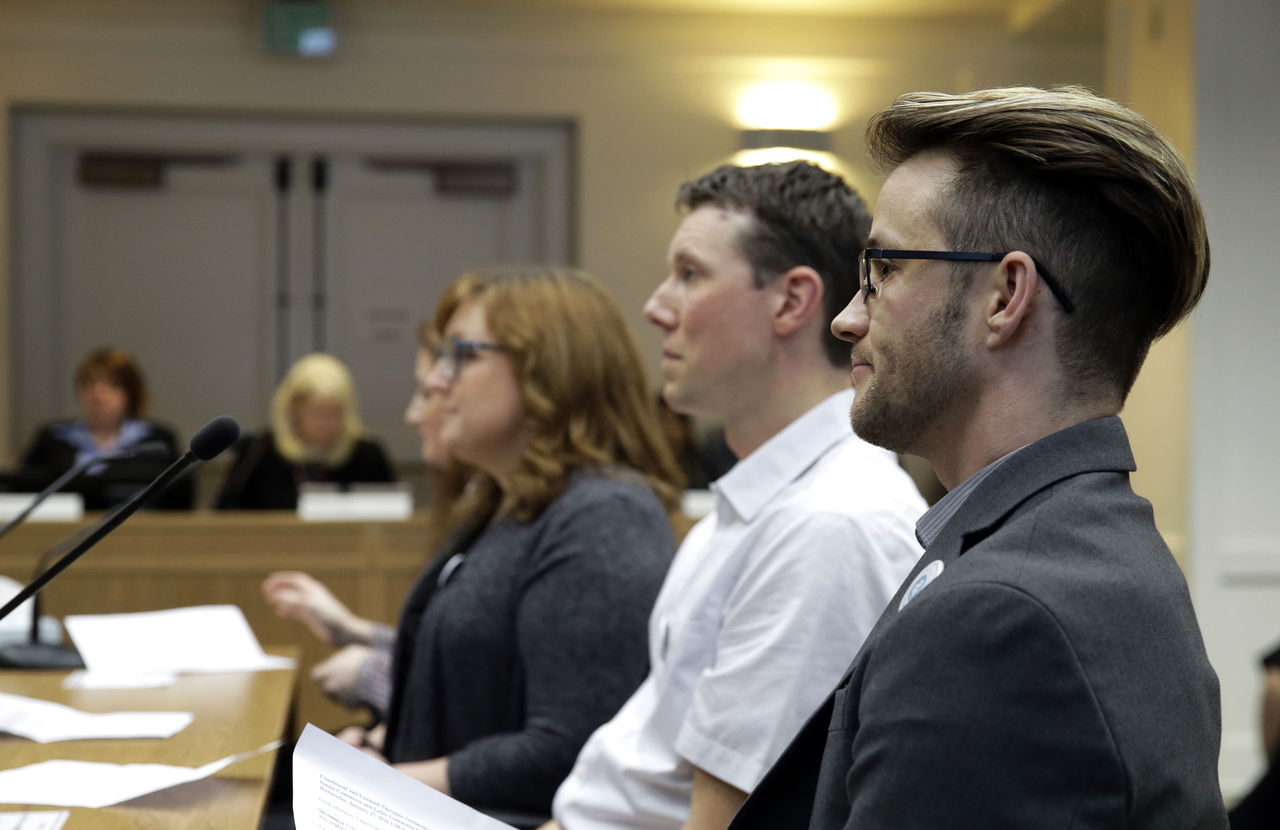 Ted S. Warren / Associated Press A group of people opposing a bill that would eliminate Washingtonþ’s new rule allowing transgender people use gender-segregated bathrooms and locker rooms in public buildings consistent with their gender identity listen to questions from lawmakers after they testified during a public hearing Wednesday in a Washington Senate hearing room at the Capitol in Olympia. At right is Tyler Stewart, of Olympia, who identified himself as a transgender man.