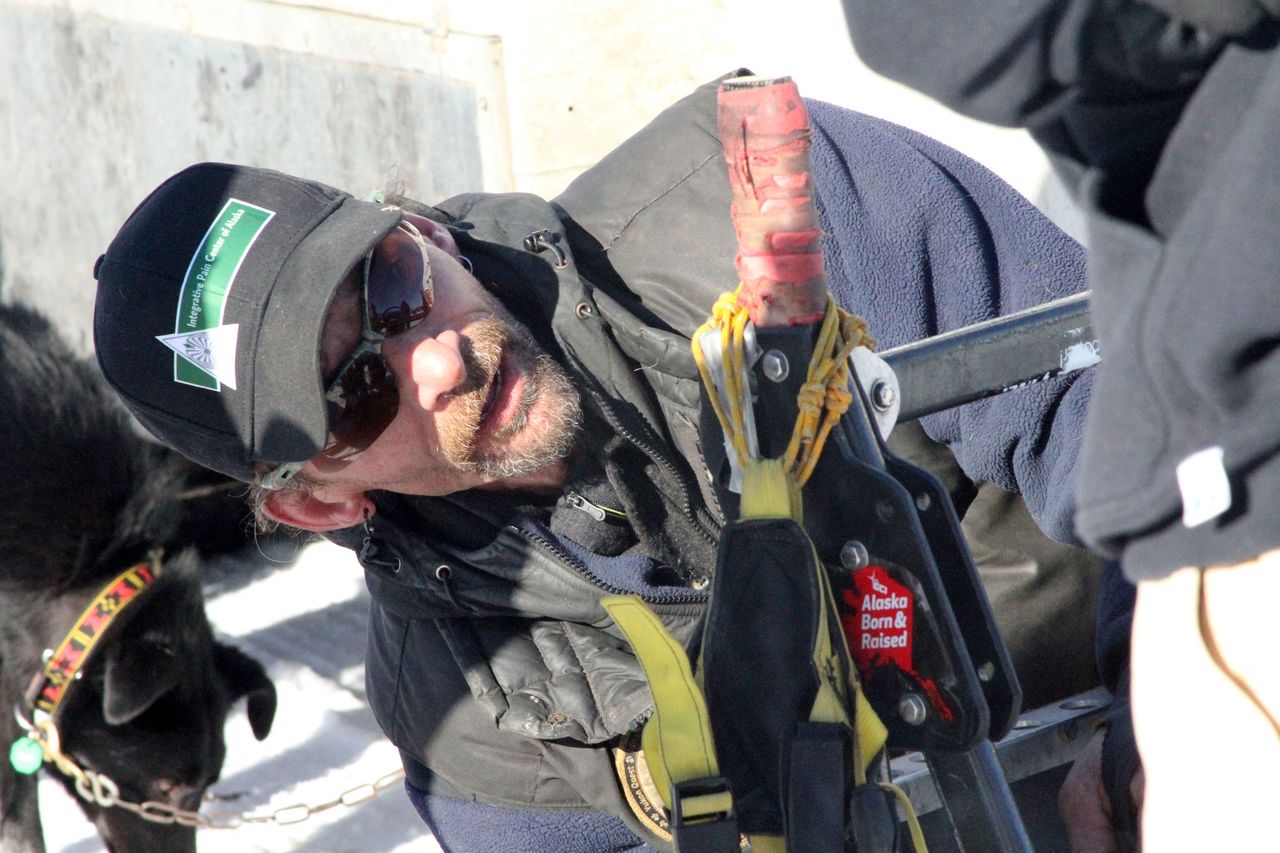 Four-time Iditarod Trail Sled Dog Race champion Lance Mackey prepares his sled ahead of the official start of this year’s race Sunday in Willow, Alaska.