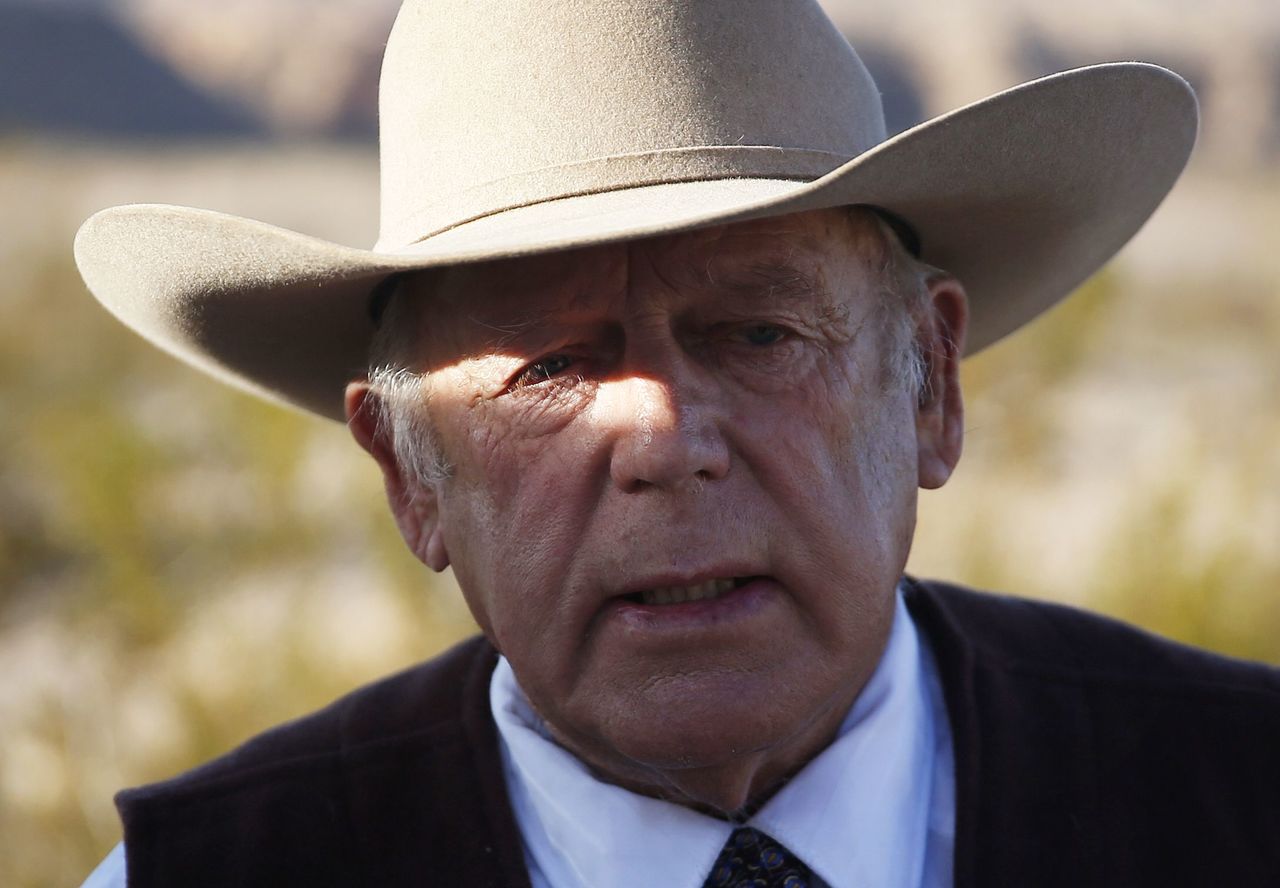 In this Jan. 27 photo, rancher Cliven Bundy speaks to media while standing along the road near his ranch in Bunkerville, Nevada. Bundy, the renegade rancher at the center of a states versus federal rights fight, has made his first appearance in custody before a U.S. judge in Las Vegas.