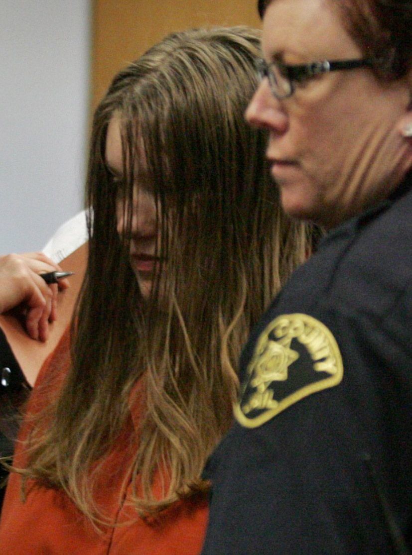 This Jan. 8, 2008, photo shows Michele Anderson (left), who was convicted Friday of killing six members of her family on Dec. 24, 2007, in Carnation. Anderson was found guilty of six counts of first-degree aggravated murder following a five-week trial in King County Superior Court.
