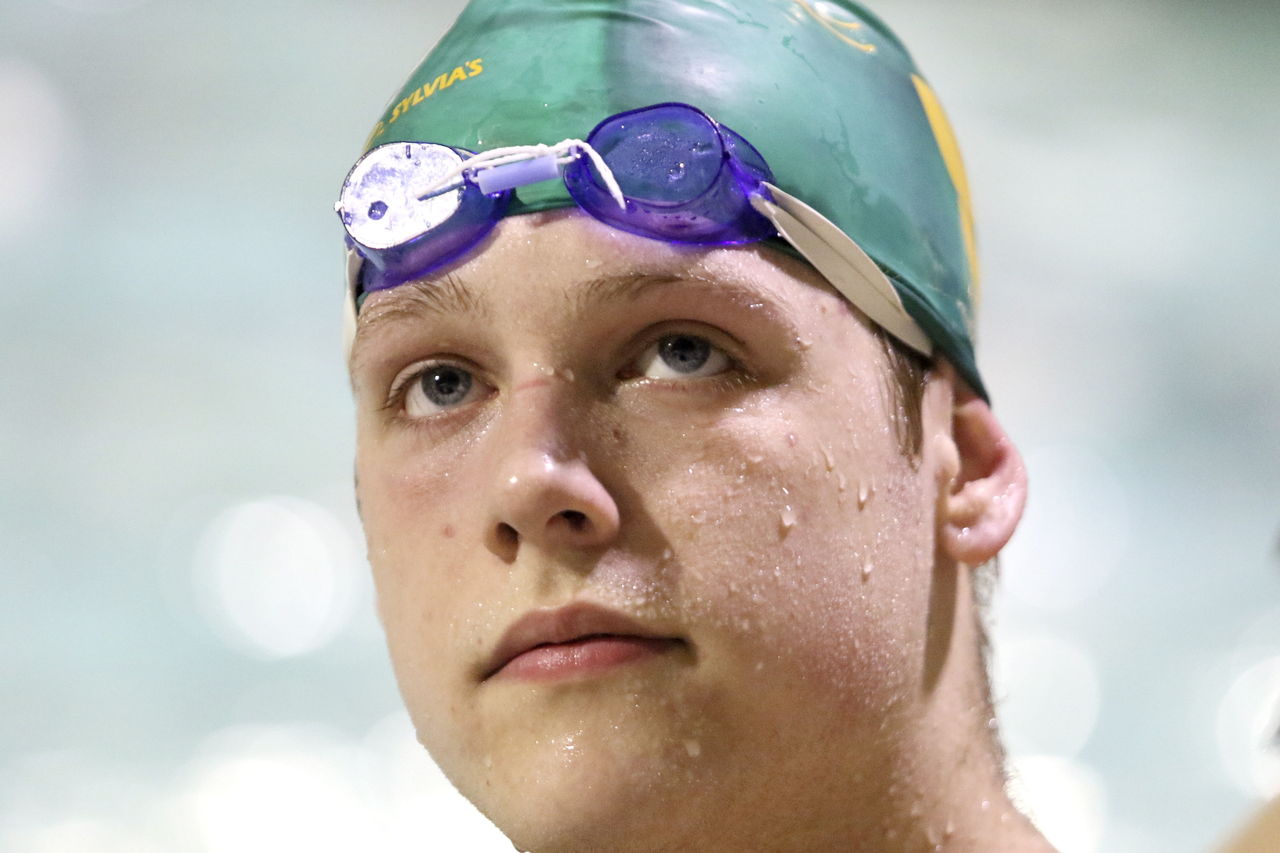 Shorecrest senior Grant Hiesey glances at the clock during practice Wednesday at Shoreline Pool.