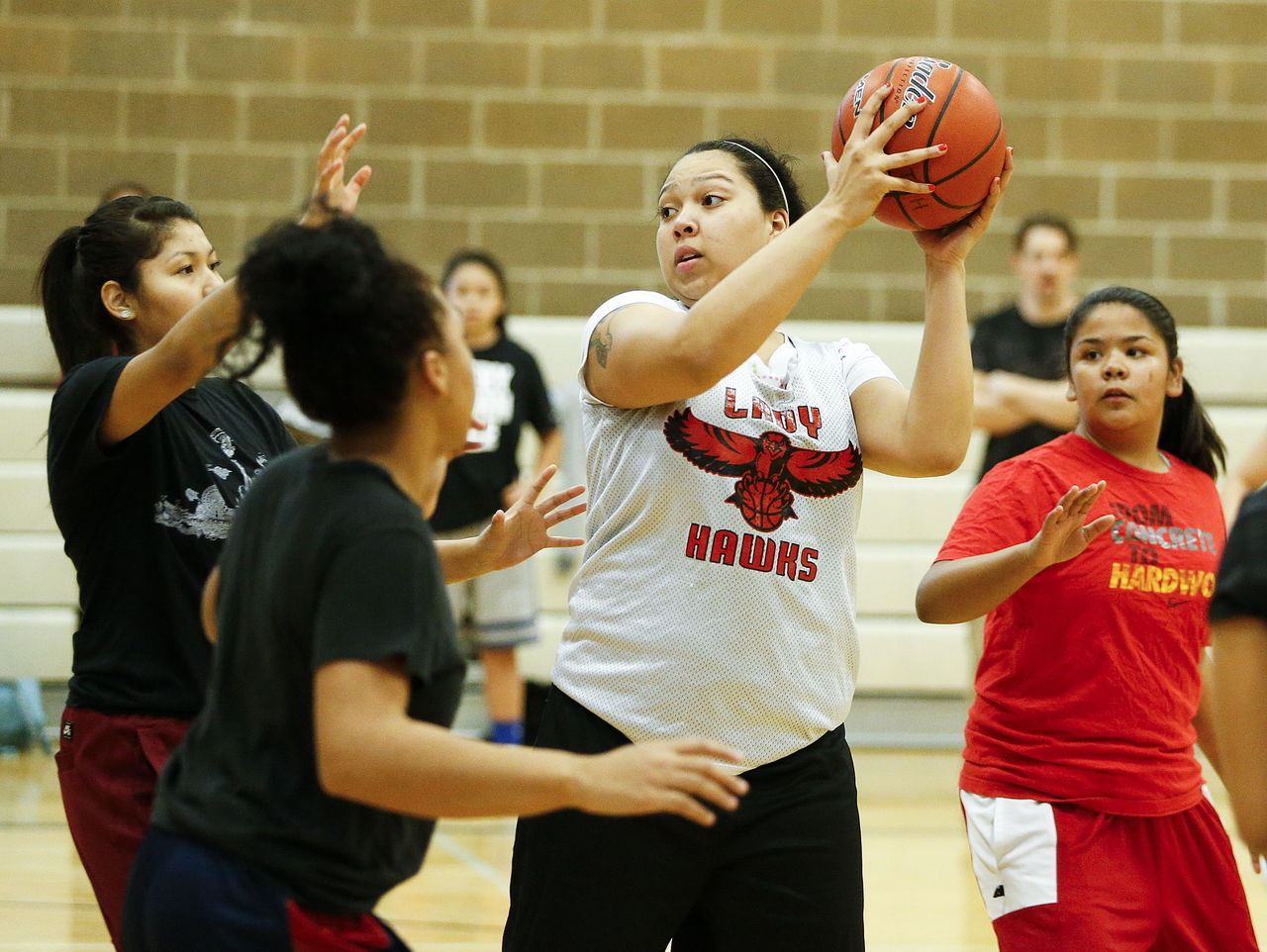 Tulalip Heritage’s Adiya Jones (center) practices with the Hawks last week.