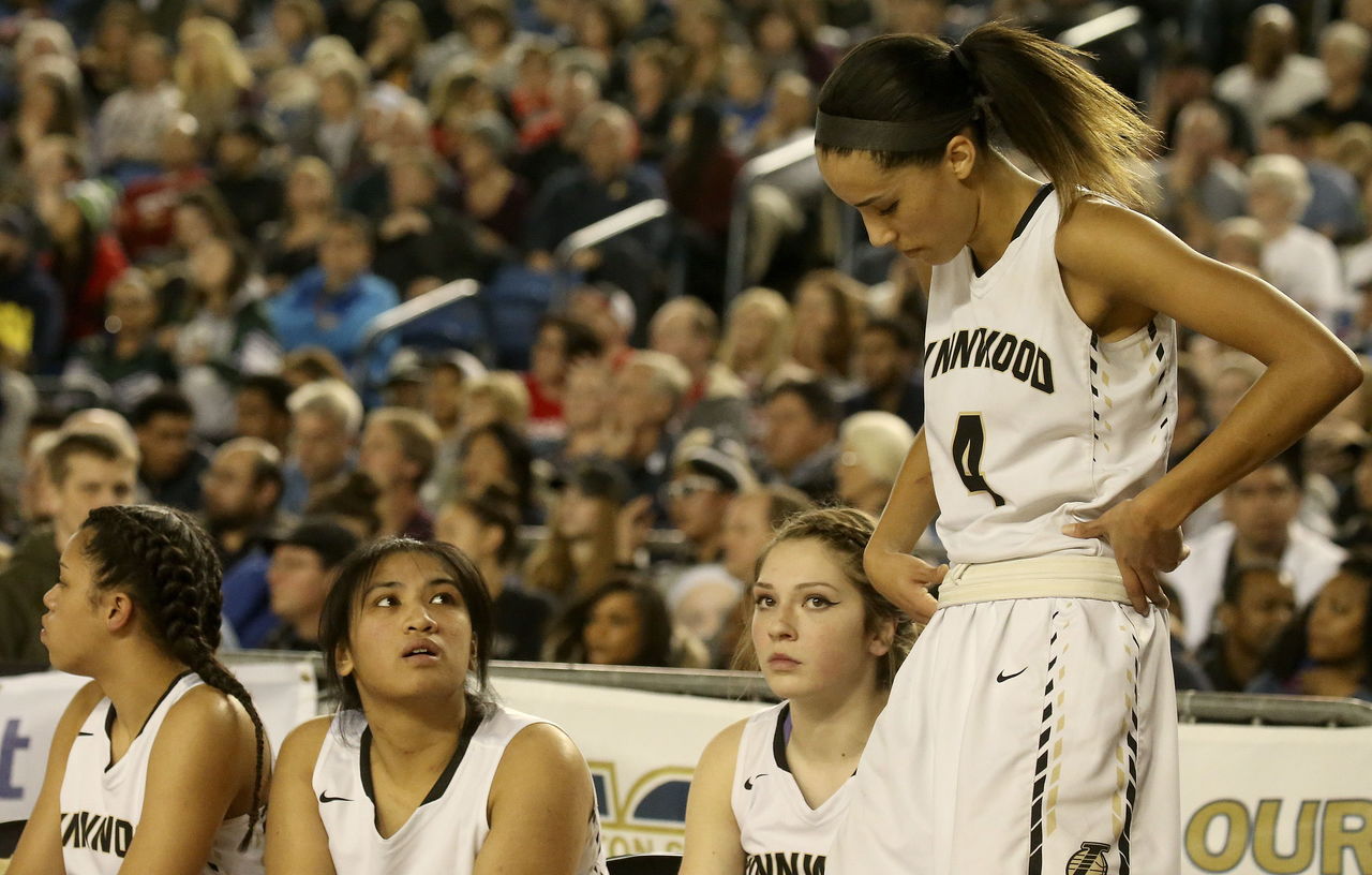 Lynnwood’s Jordyn Edwards heads to the bench after fouling out in the fourth quarter of a 3A state semifinal game Friday night against Bellevue.