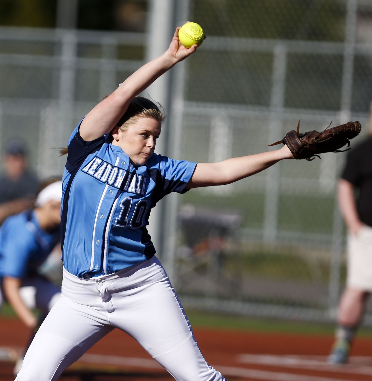 Meadowdale’s Lauren Dent delivers a pitch on her way to throwing a no-hitter against Lynnwood on Friday at Lynnwood High School.