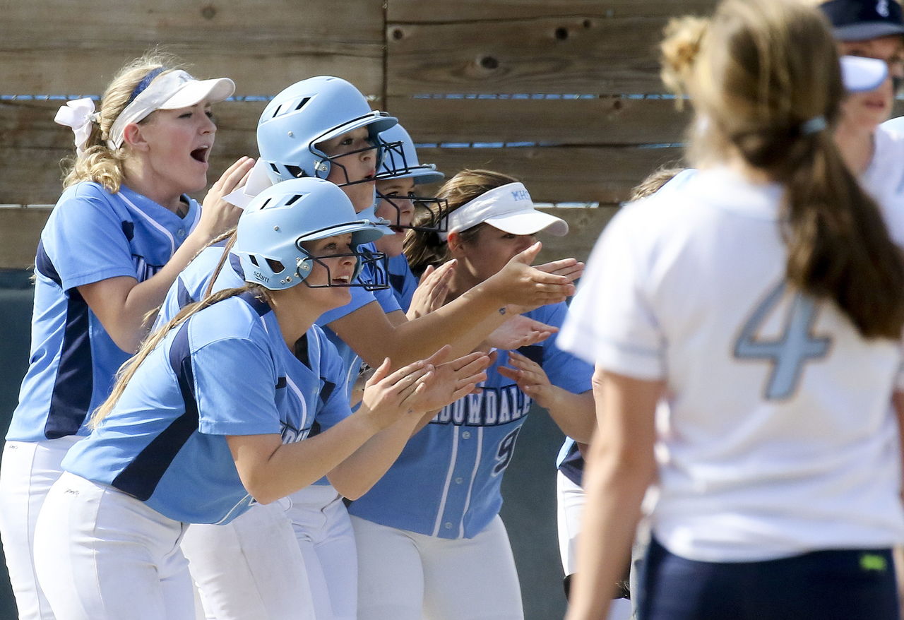 Meadowdale teammates celebrate a home run during a game against Lynnwood on Thursday at Meadowdale High School. The Mavericks beat the Seagulls 11-1 in five innings.